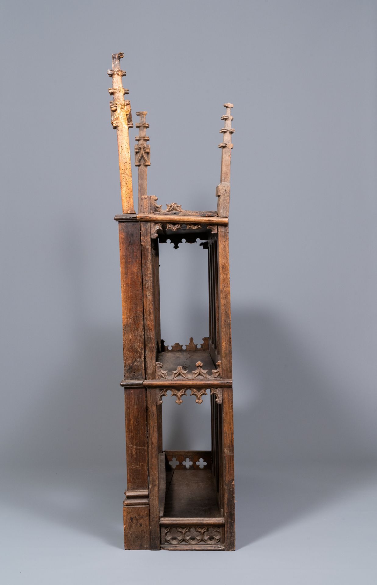 A carved oak shelf with pinnacles and stylised flowers and carved panels, 15th C. and later - Image 5 of 12