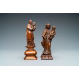 Two wooden figures of a Madonna with child, 17/18th C.