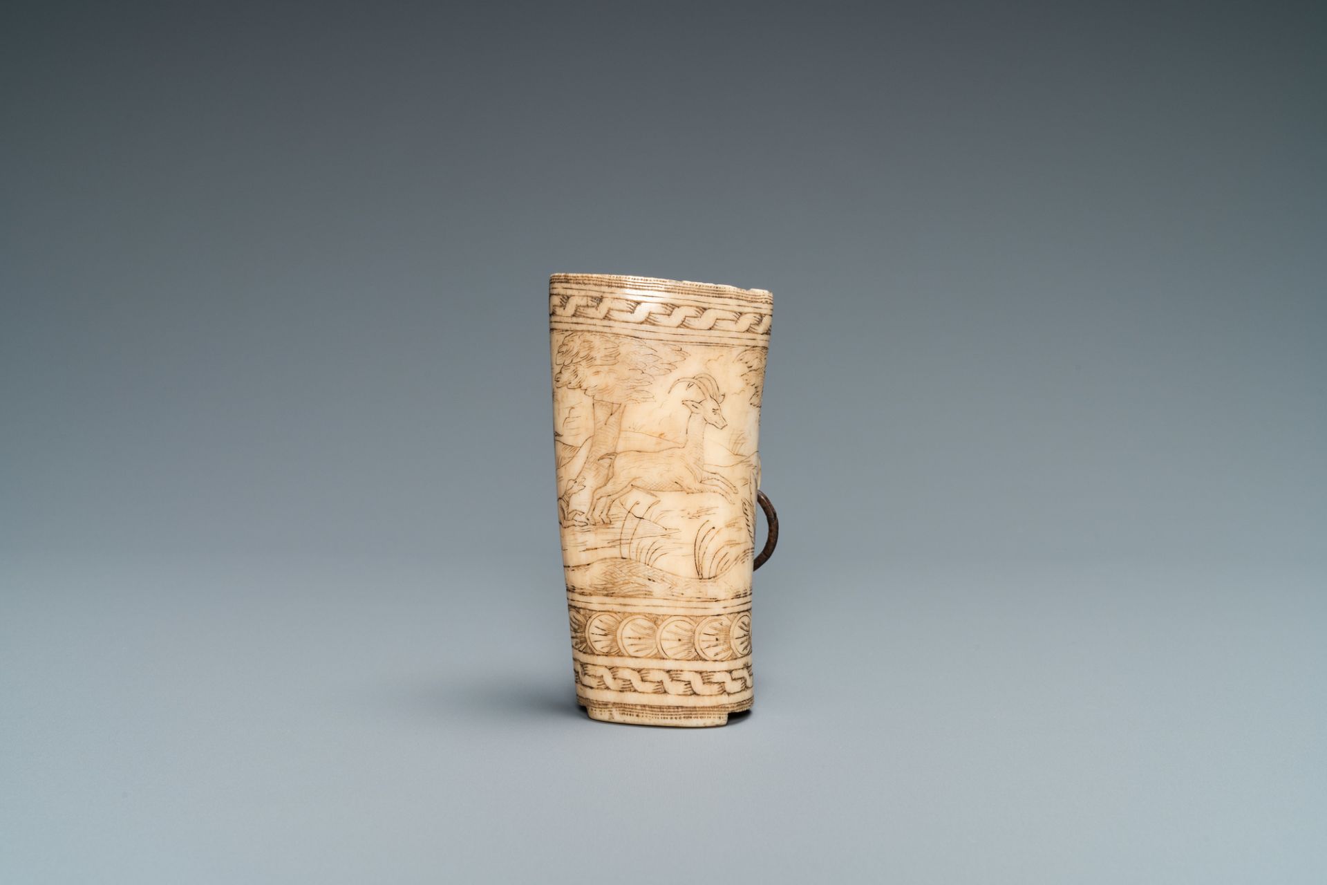 The central part of a stag horn powder flask with engraved design of 'Diana hunting deer', 17th C. - Image 3 of 7