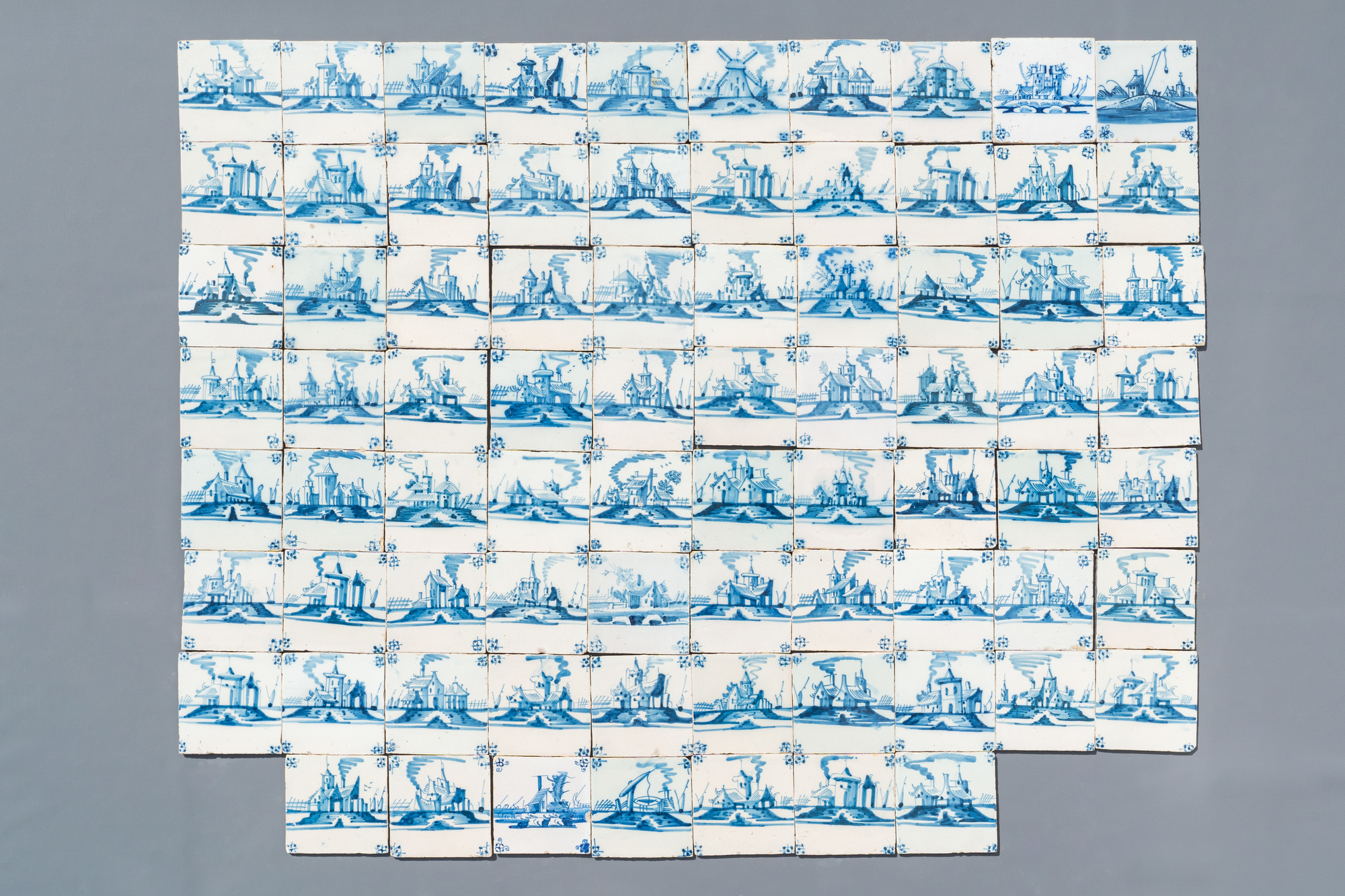 Seventy_seven blue and white Dutch Delft 'landscape' tiles, late 18th C.