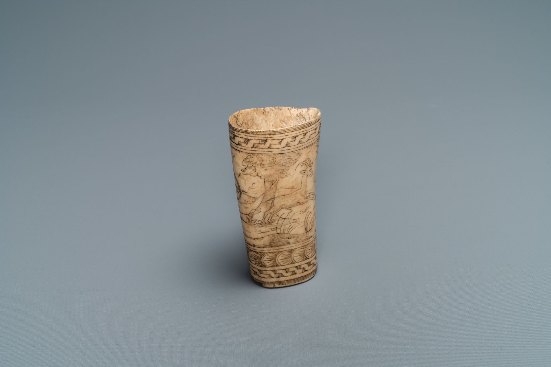 The central part of a stag horn powder flask with engraved design of 'Diana hunting deer', 17th C. - Image 2 of 7