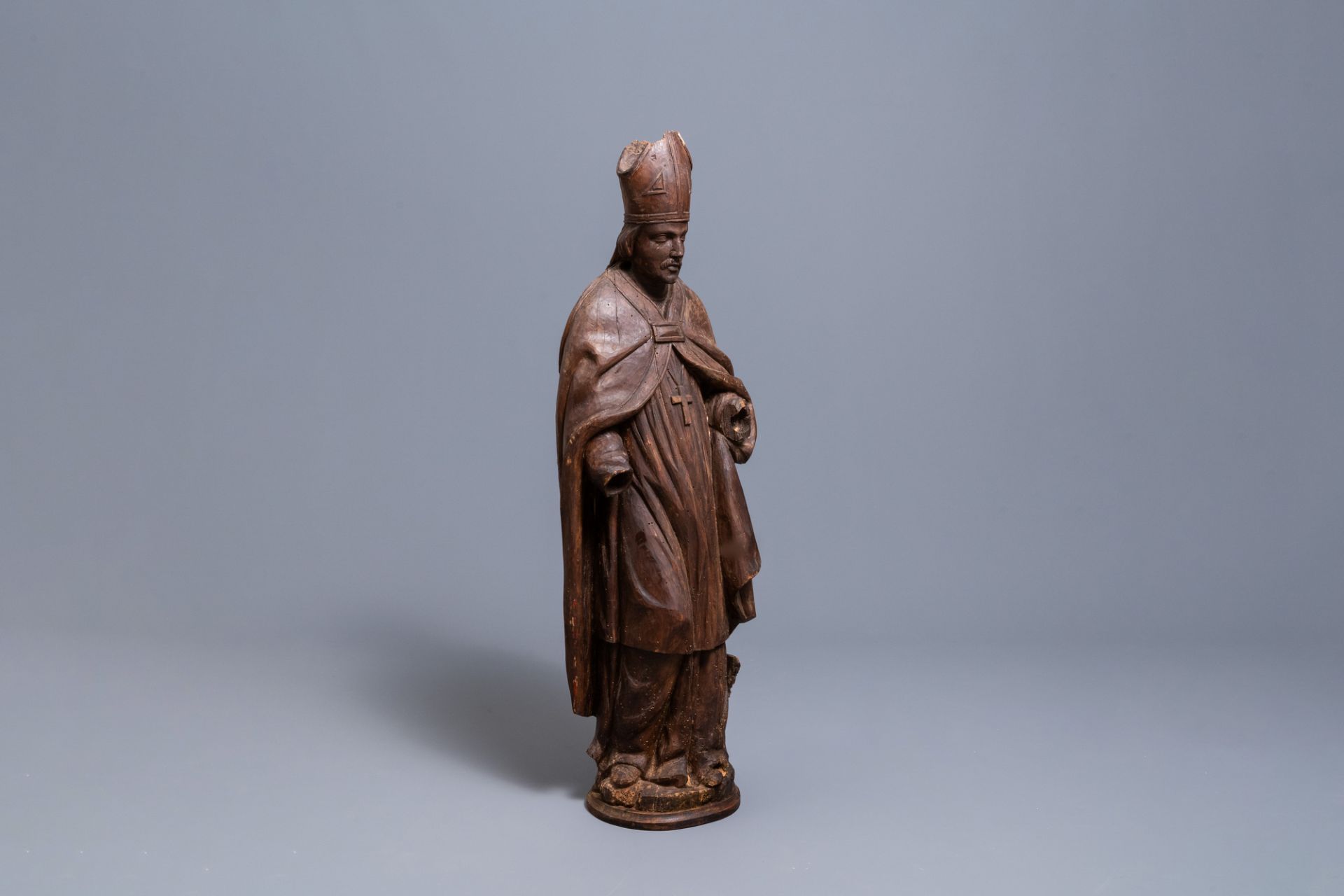 A large limewood figure of a bishop, 18th C.