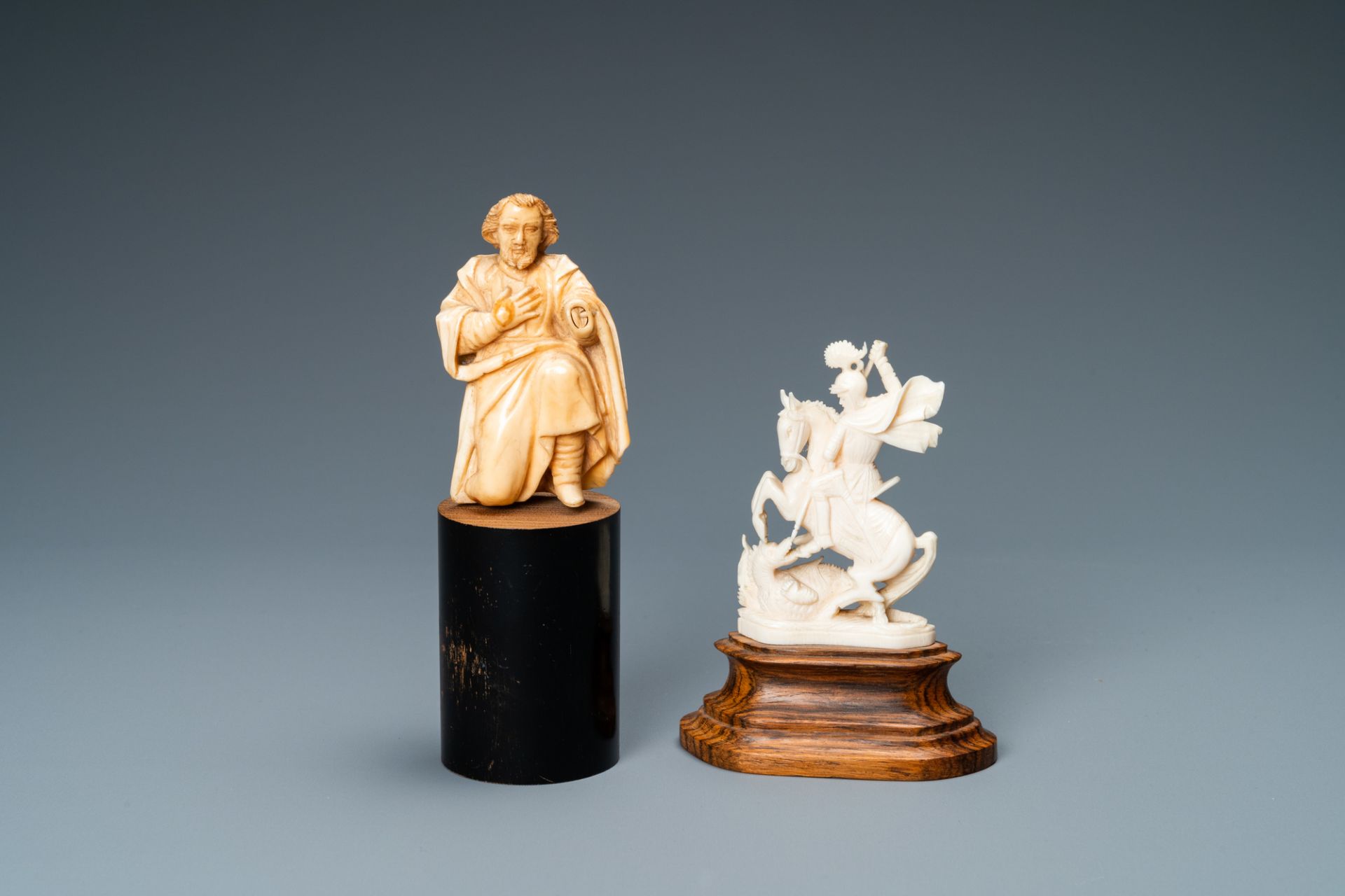 Two ivory figures: a kneeling Saint Joseph, Spain, 17th C. and Saint George with the dragon, 19/20th