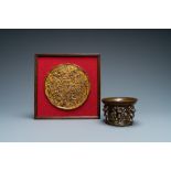 A gilded bronze 'Apollo on mount Parnassus' plaque and a bronze mortar, Flanders, 16th C.