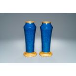 A pair of monochome powder blue Svres vases with gilded bronze mounts, 19th C.