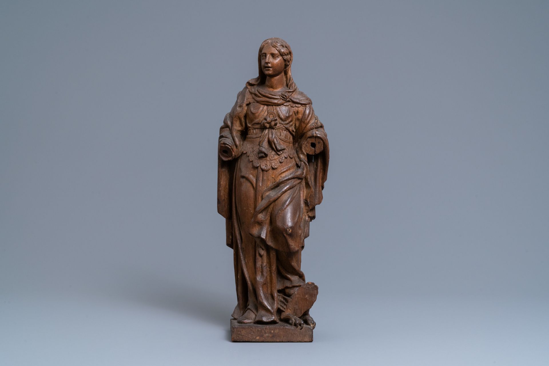 An oak figure of a female saint crushing a griffin, 2nd half 16th C. - Image 2 of 7