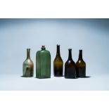 Five green glass bottles, 17/18th C.