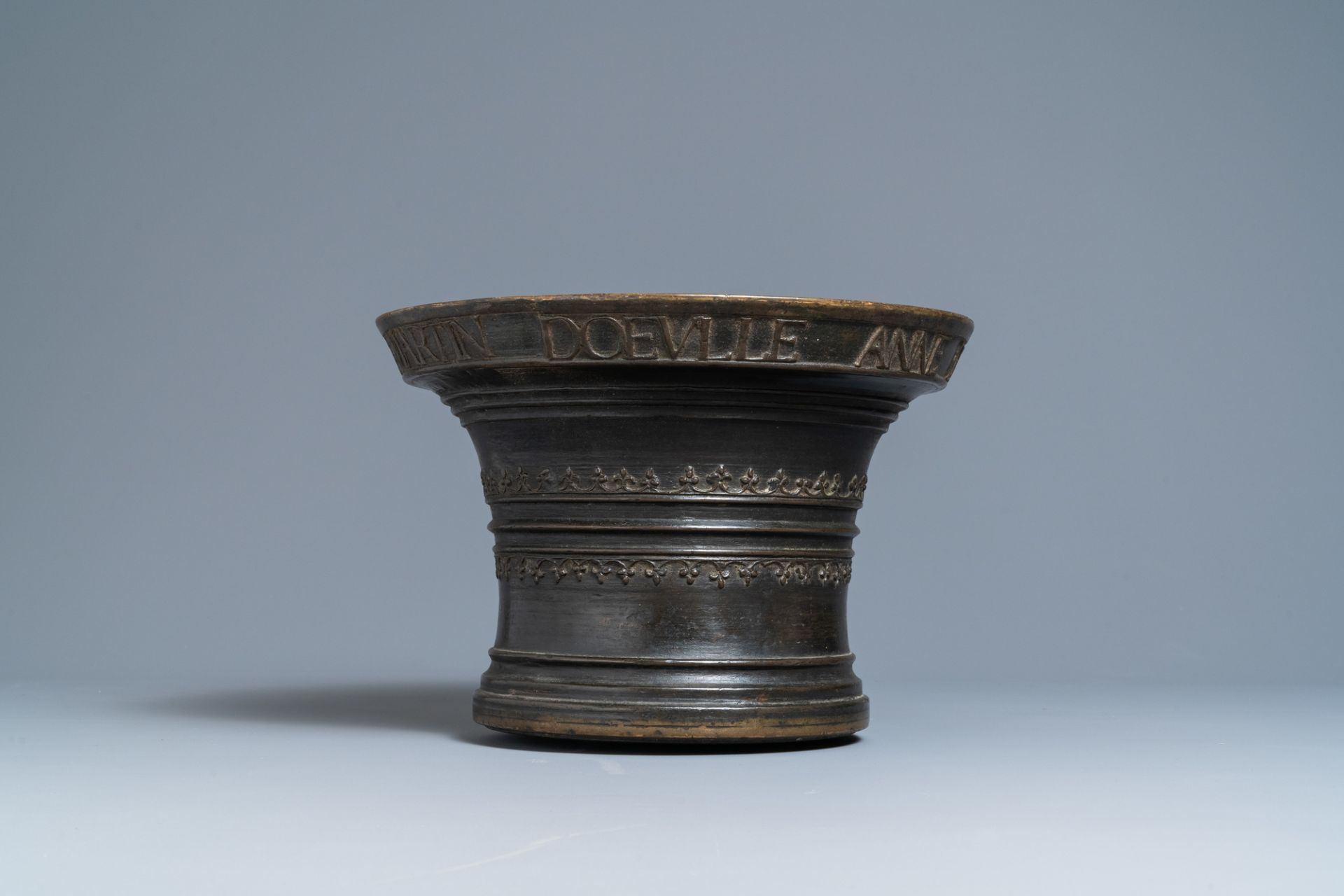 A large bronze mortar dated 1557 and inscribed for Martin Doeulle, North of France - Image 4 of 6