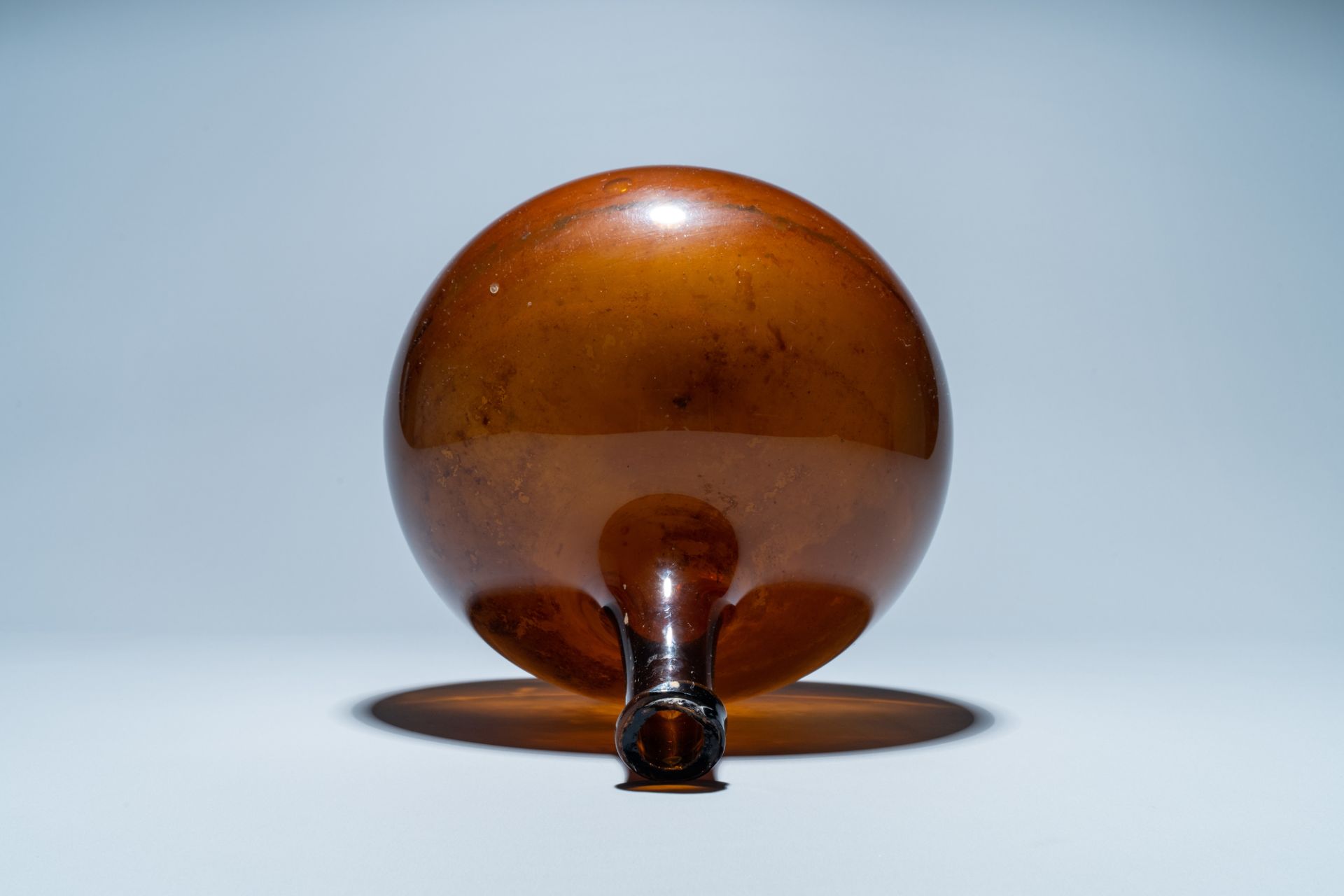 A brown glass bottle, 18th C. - Image 5 of 6