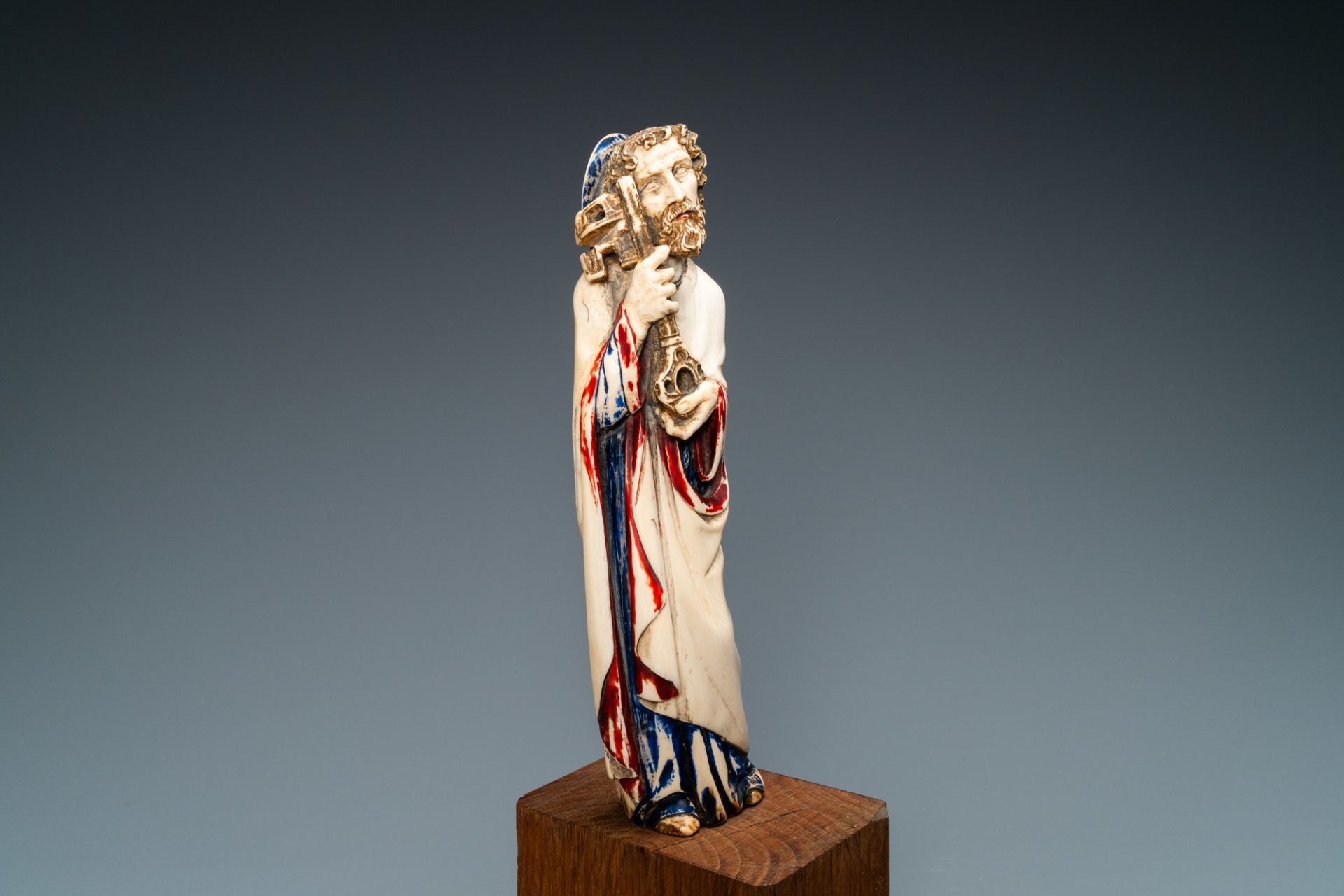 A polychromed ivory figure of Saint Peter, 19th C.