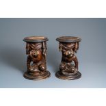 A pair of patinated coniferous wood candle supports in the shape of kneeling Moors, Venice, Italy, 1