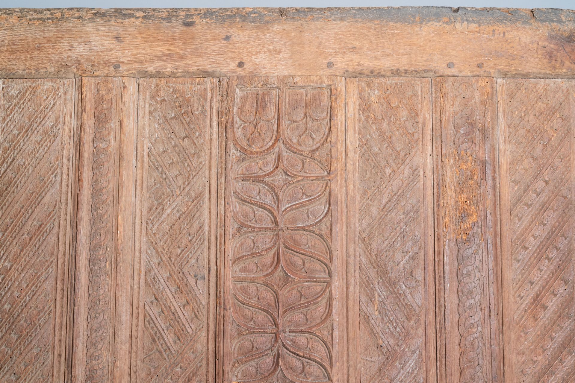 A carved oak front panel of a coffer with tracery panels and geometrical motives, Brittany, France, - Image 2 of 4