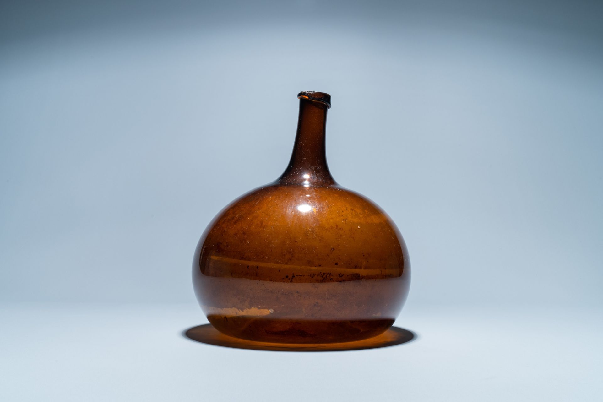 A brown glass bottle, 18th C. - Image 4 of 6