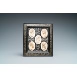 Five ivory portrait medallions set in a pewter-mounted ebony frame, France and/or Italy, 19th C.