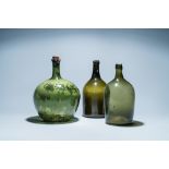 Three large green glass bottles, 18th C.