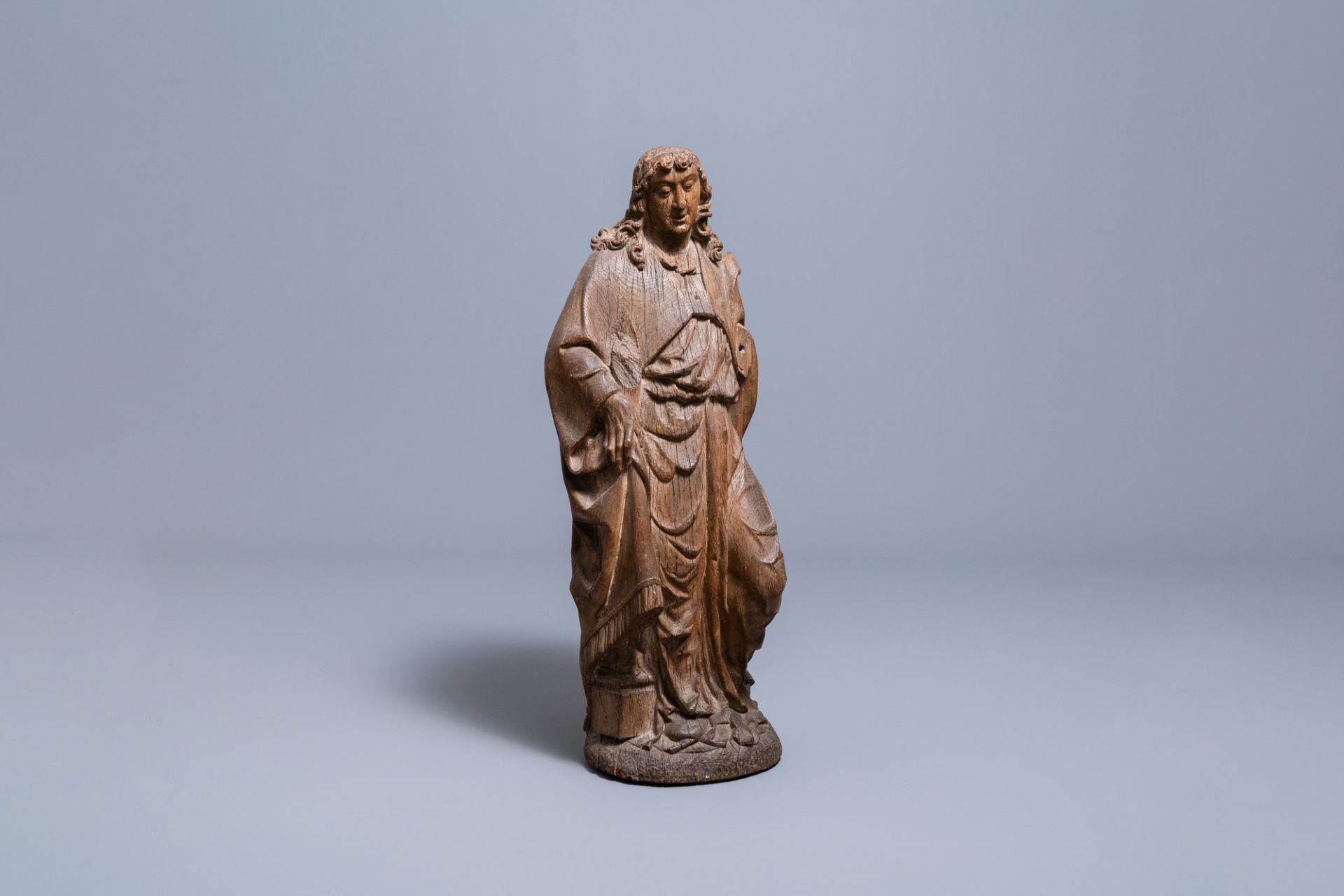 A large oak figure of an angel holding the Instruments of the Passion, Germany or Mosan region, 16th