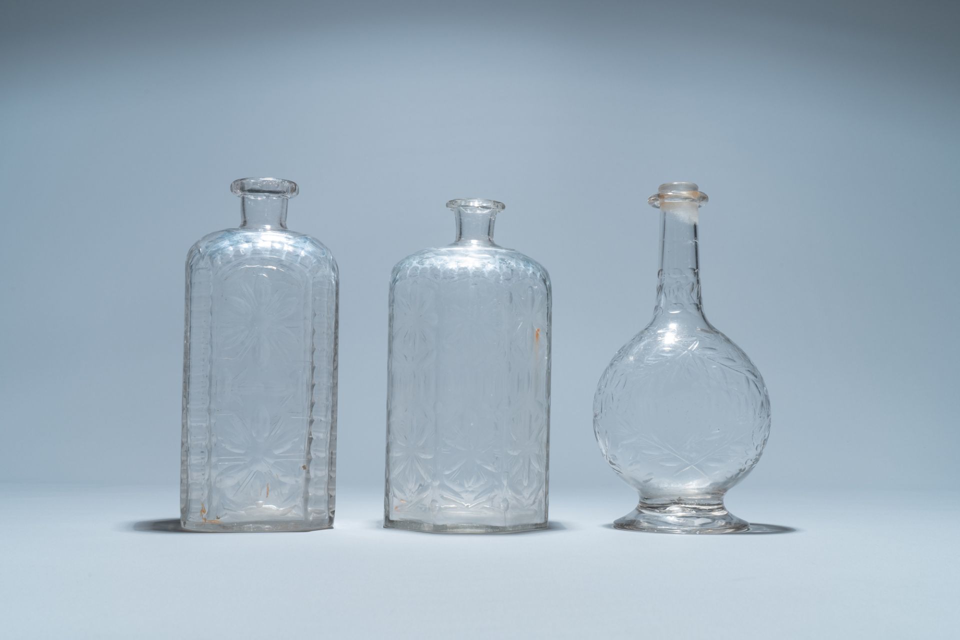 Three weel-cut glass bottles, probably Liege, 18/19th C. - Image 4 of 7