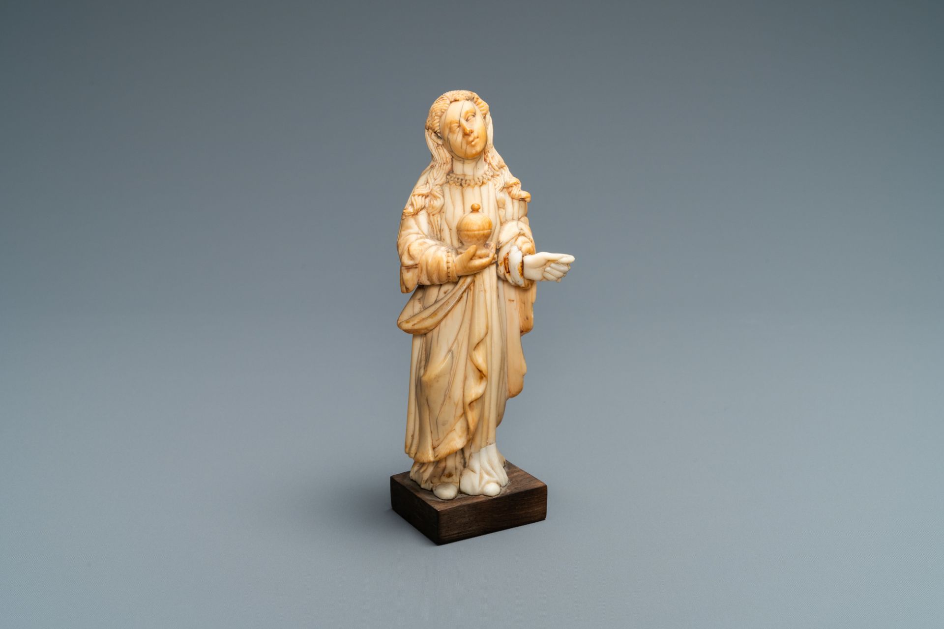 An Indo-Portuguese ivory figure of Mary Magdalen with an ointment jar, probably Goa, 17/18th C.