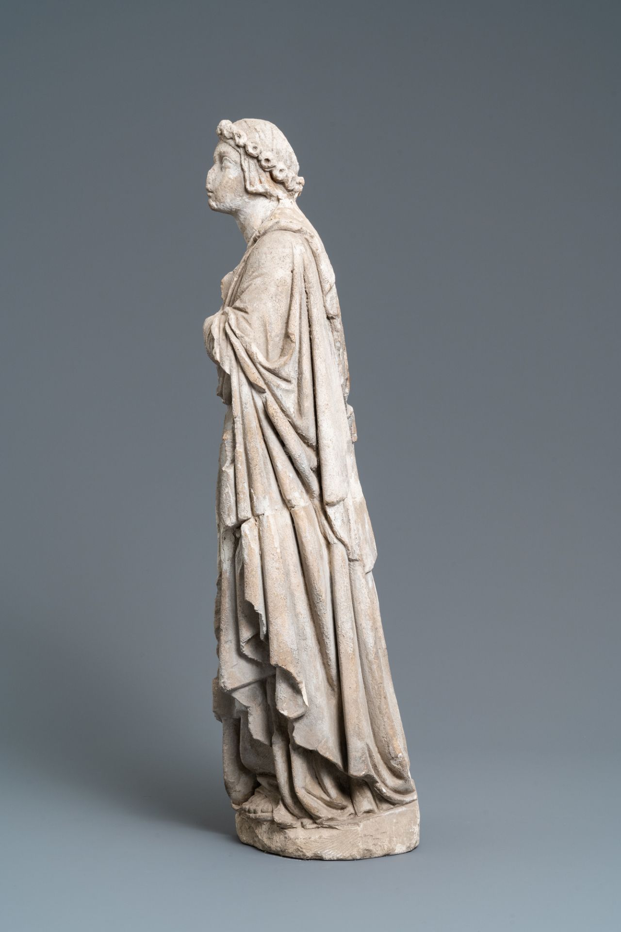 A limestone figure of Saint Barbara, 16th C. - Image 6 of 8