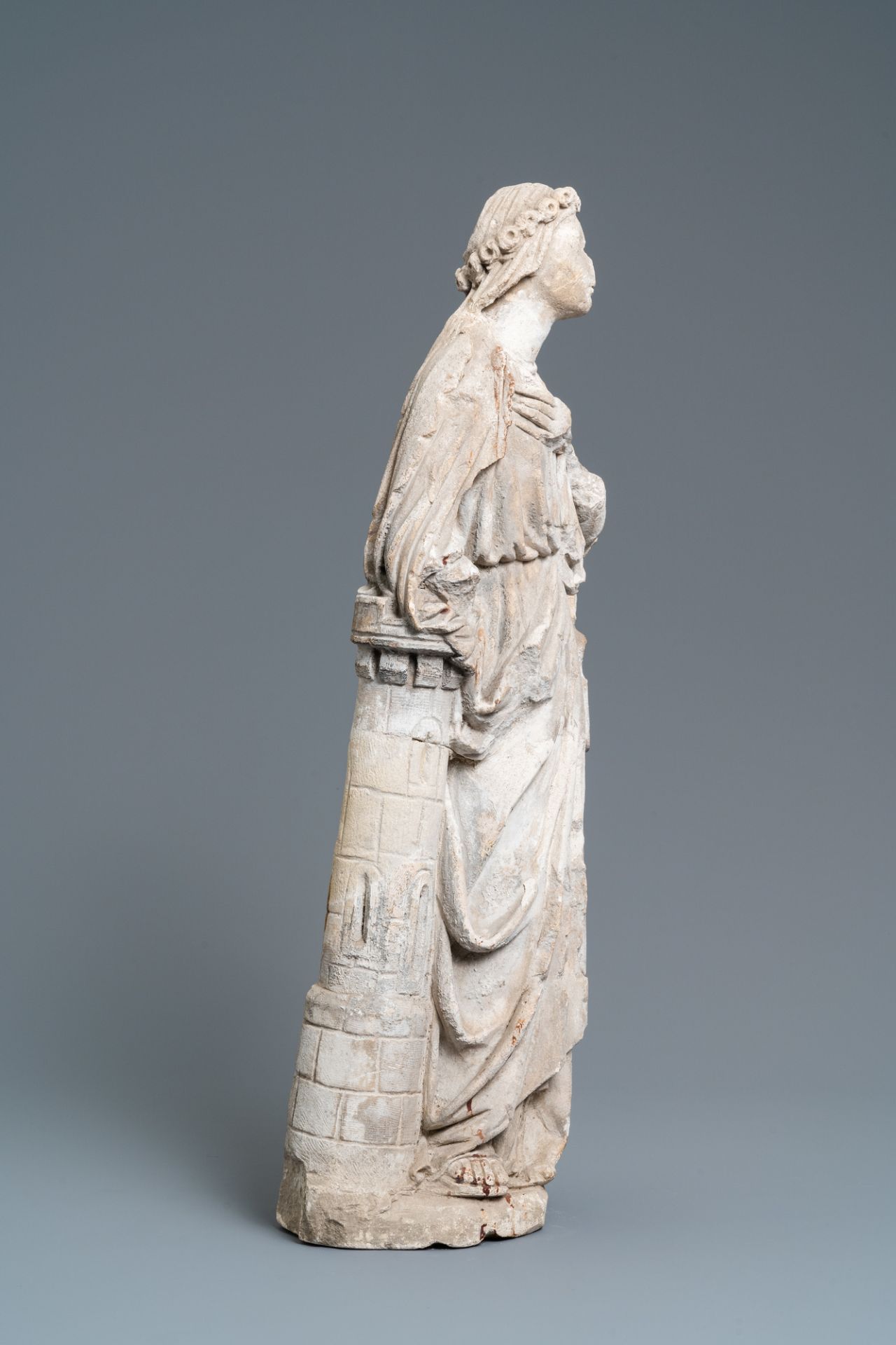 A limestone figure of Saint Barbara, 16th C. - Image 4 of 8