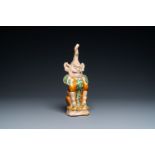 A Chinese sancai-glazed pottery 'earth spirit' figure, Tang