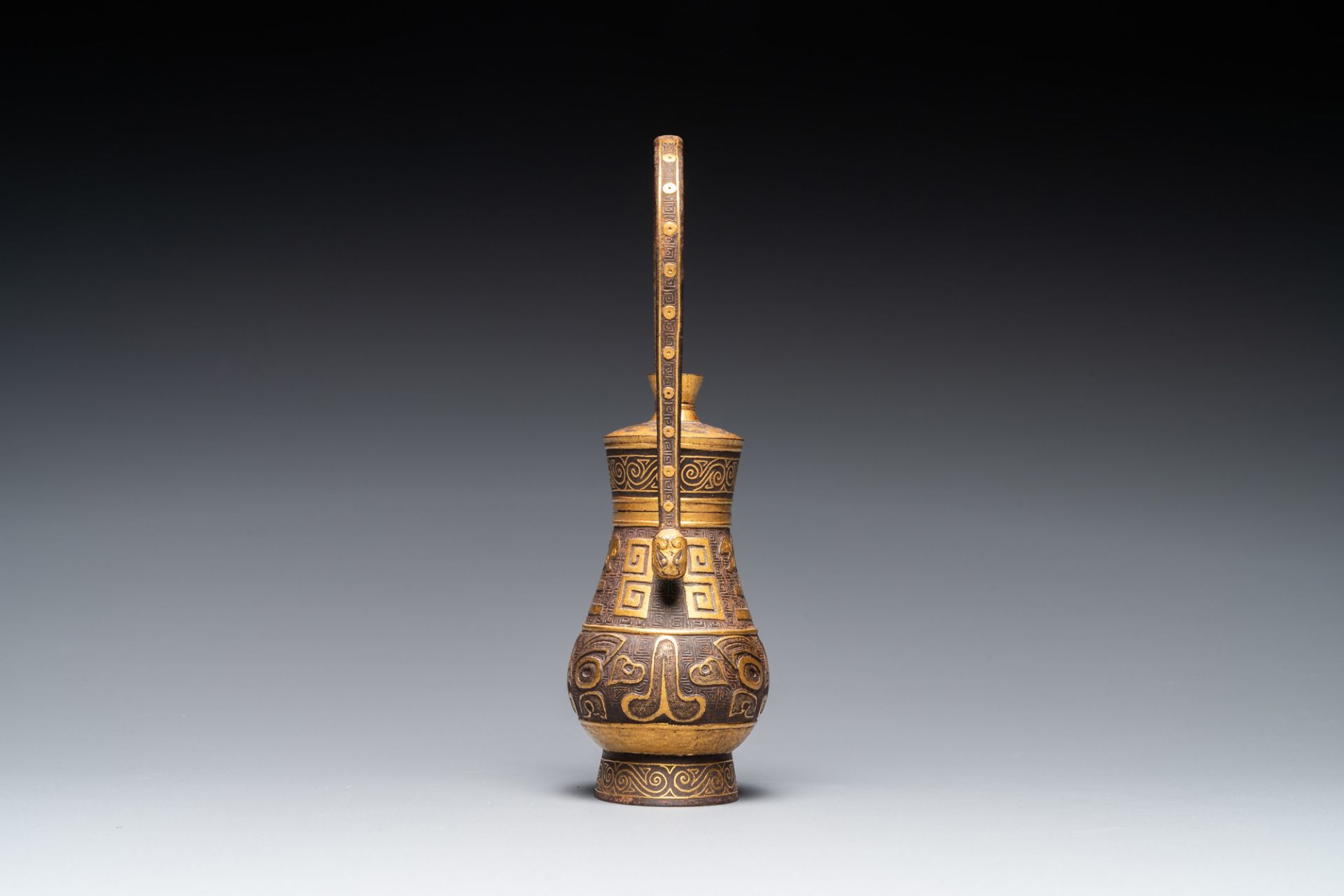 A Chinese gold-leaf-decorated cast iron vase and cover, probably 19th C. - Image 5 of 7