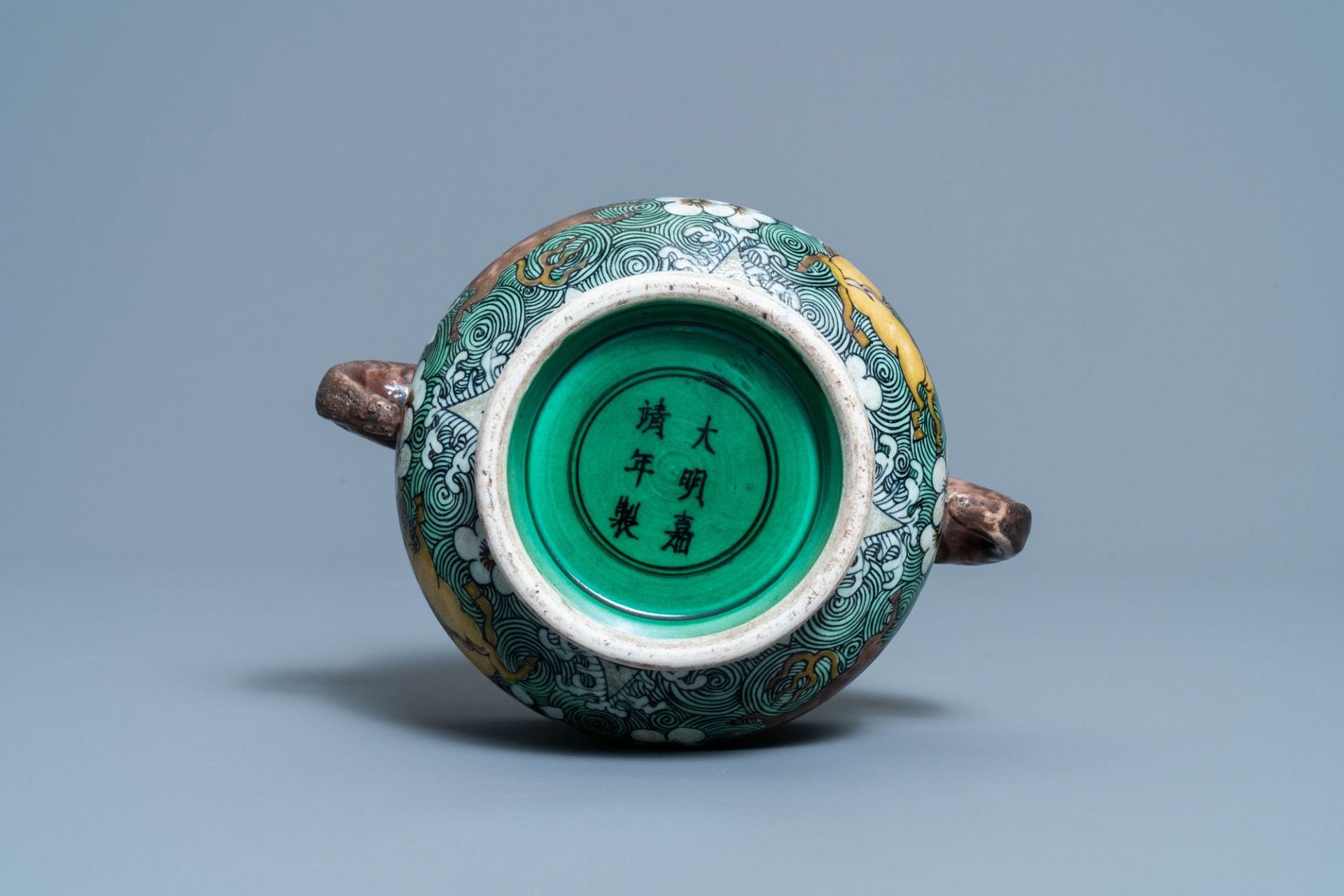 A Chinese verte biscuit 'flaming horses' censer, Jiajing mark, 18/19th C. - Image 6 of 7