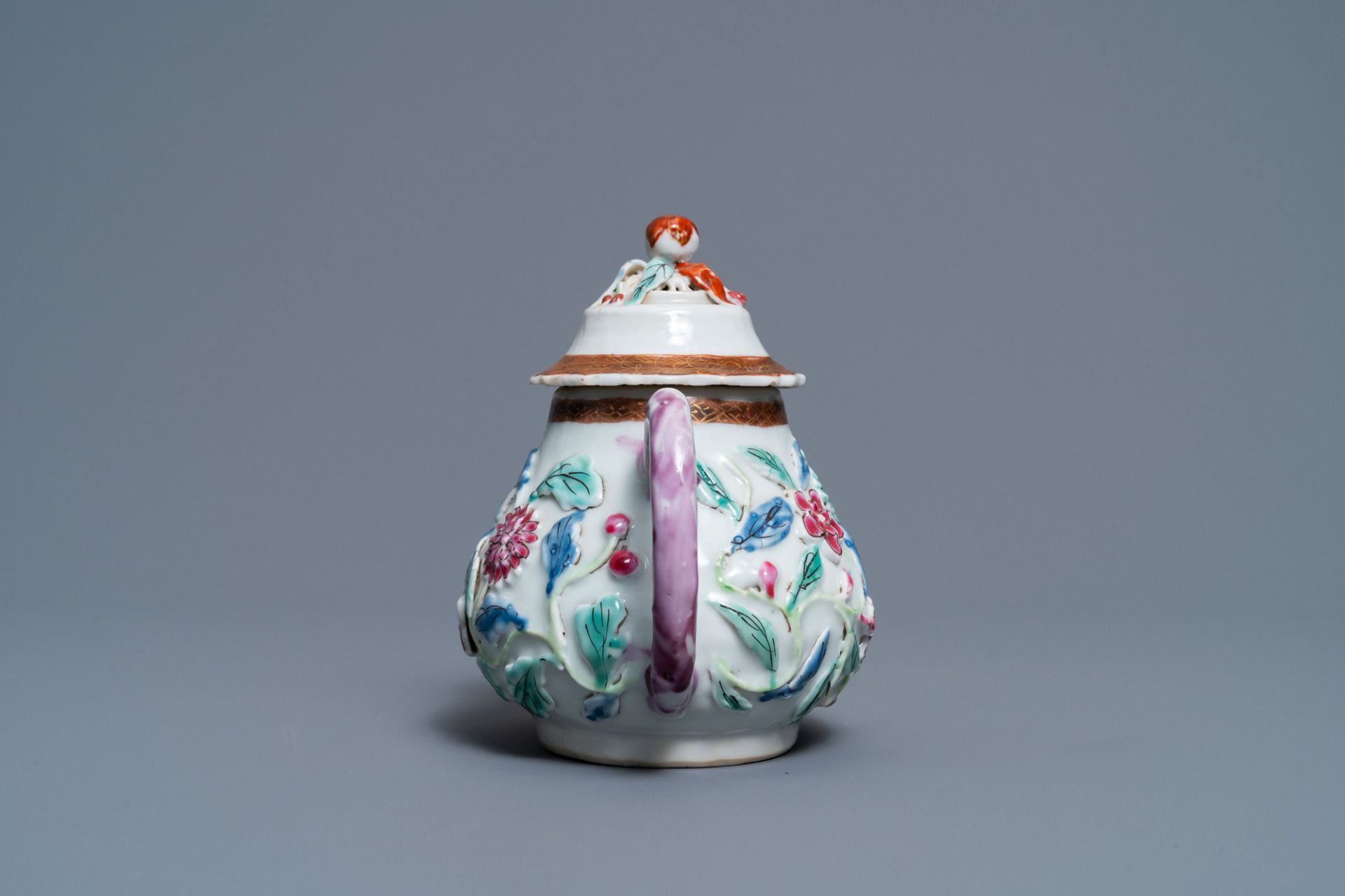 A Chinese famille rose relief-decorated teapot on stand, Yongzheng - Image 6 of 10