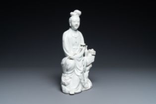 A Chinese blanc de Chine figure of Guanyin, impressed mark, 19/20th C.