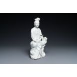 A Chinese blanc de Chine figure of Guanyin, impressed mark, 19/20th C.