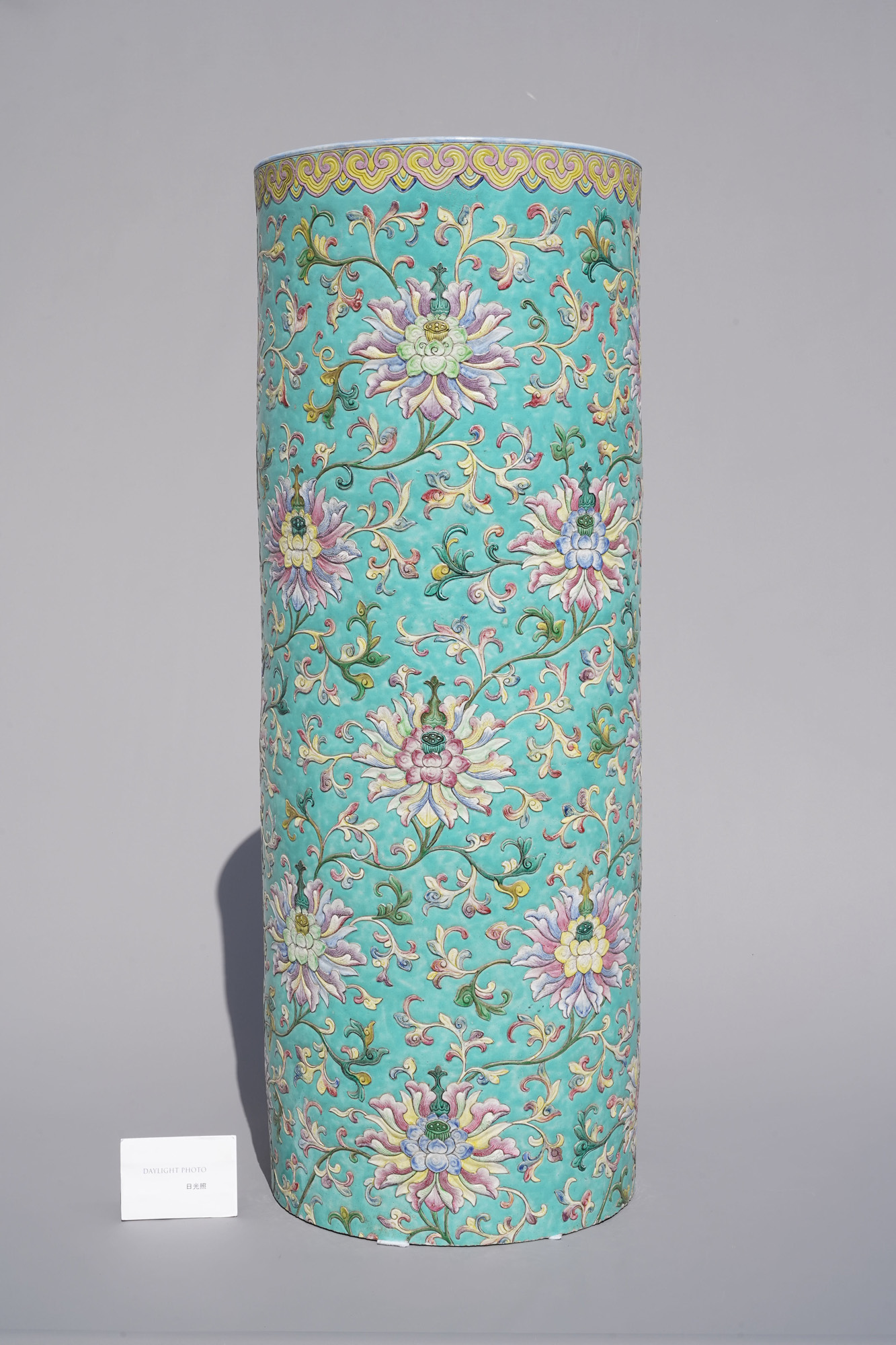 A large Chinese famille rose cylindrical vase with applied lotus scrolls, Jiaqing/Daoguang - Image 10 of 49