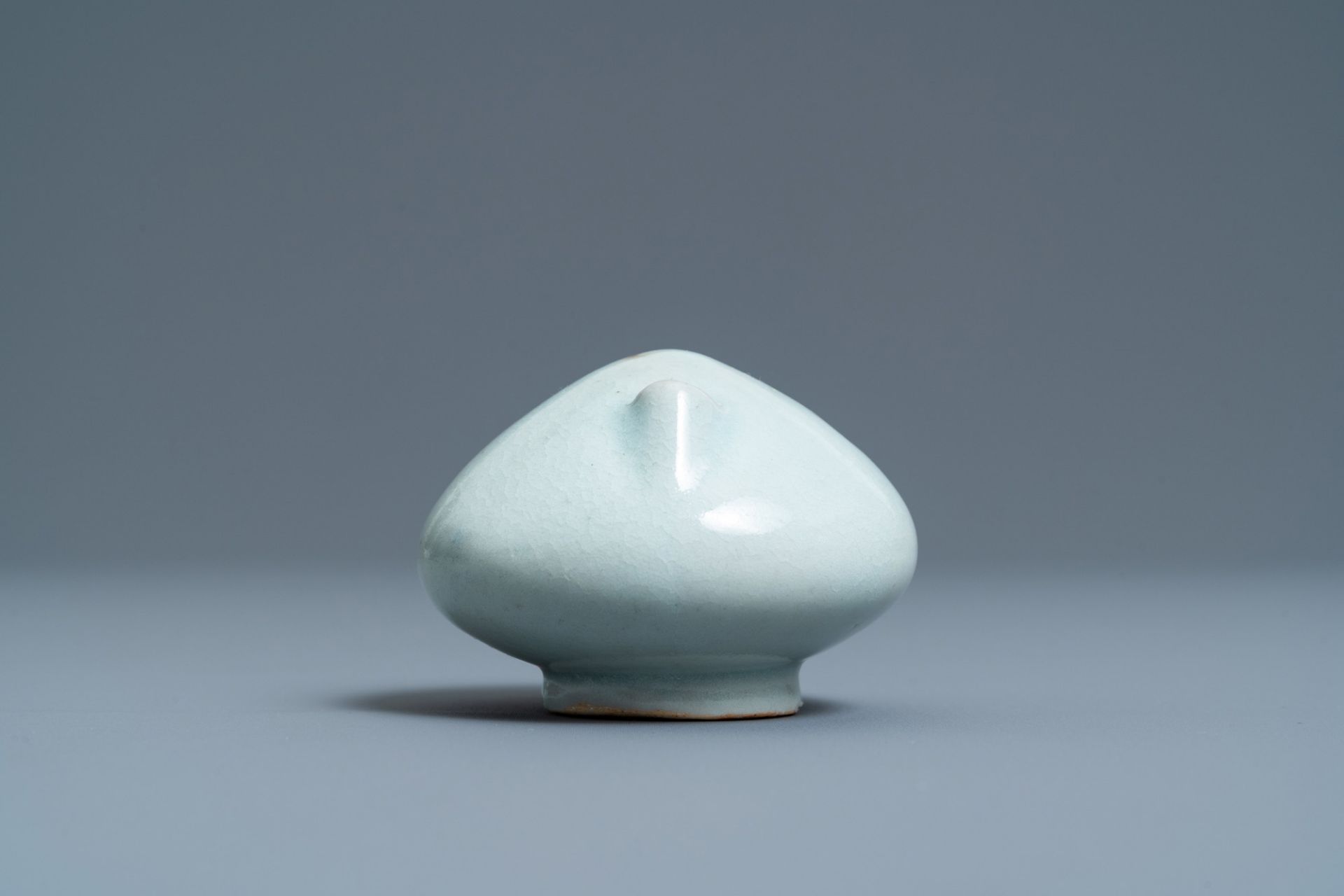 A Korean celadon-glazed water dropper, Joseon, 19th C. - Image 3 of 7