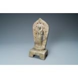 A Chinese carved and inscribed stone stele, possibly Wei