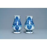 A pair of Chinese blue and white 'taotie' vases, Kangxi