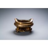 A Chinese bronze tripod censer on stand, Qianlong mark, Qing