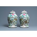 A pair of Chinese qianjiang cai vases and covers with antiquities, 19/20th C.