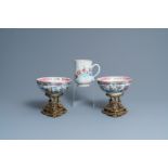 A pair of Chinese famille rose bowls on gilt bronze stand and a 'mandarin' mug, Qianlong