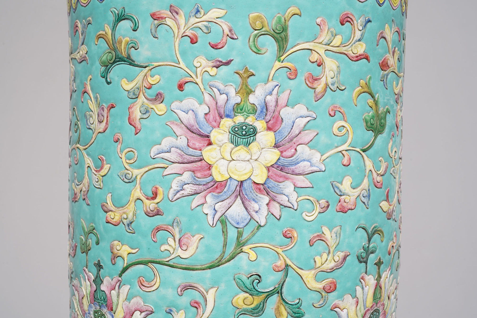 A large Chinese famille rose cylindrical vase with applied lotus scrolls, Jiaqing/Daoguang - Image 15 of 49