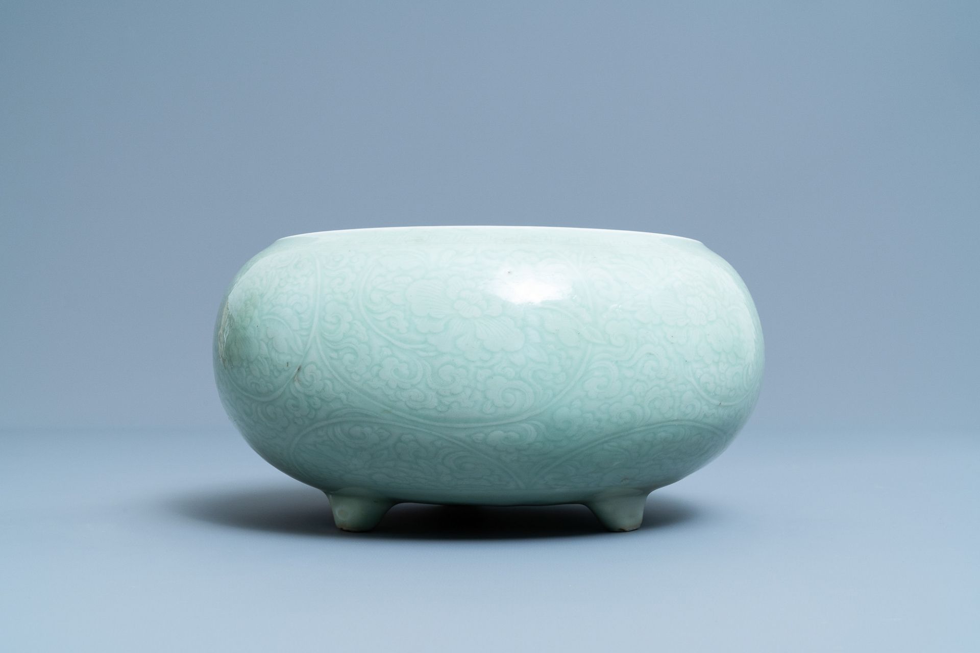 A Chinese celadon-glazed tripod censer with incised underglaze design, Kangxi - Image 5 of 26