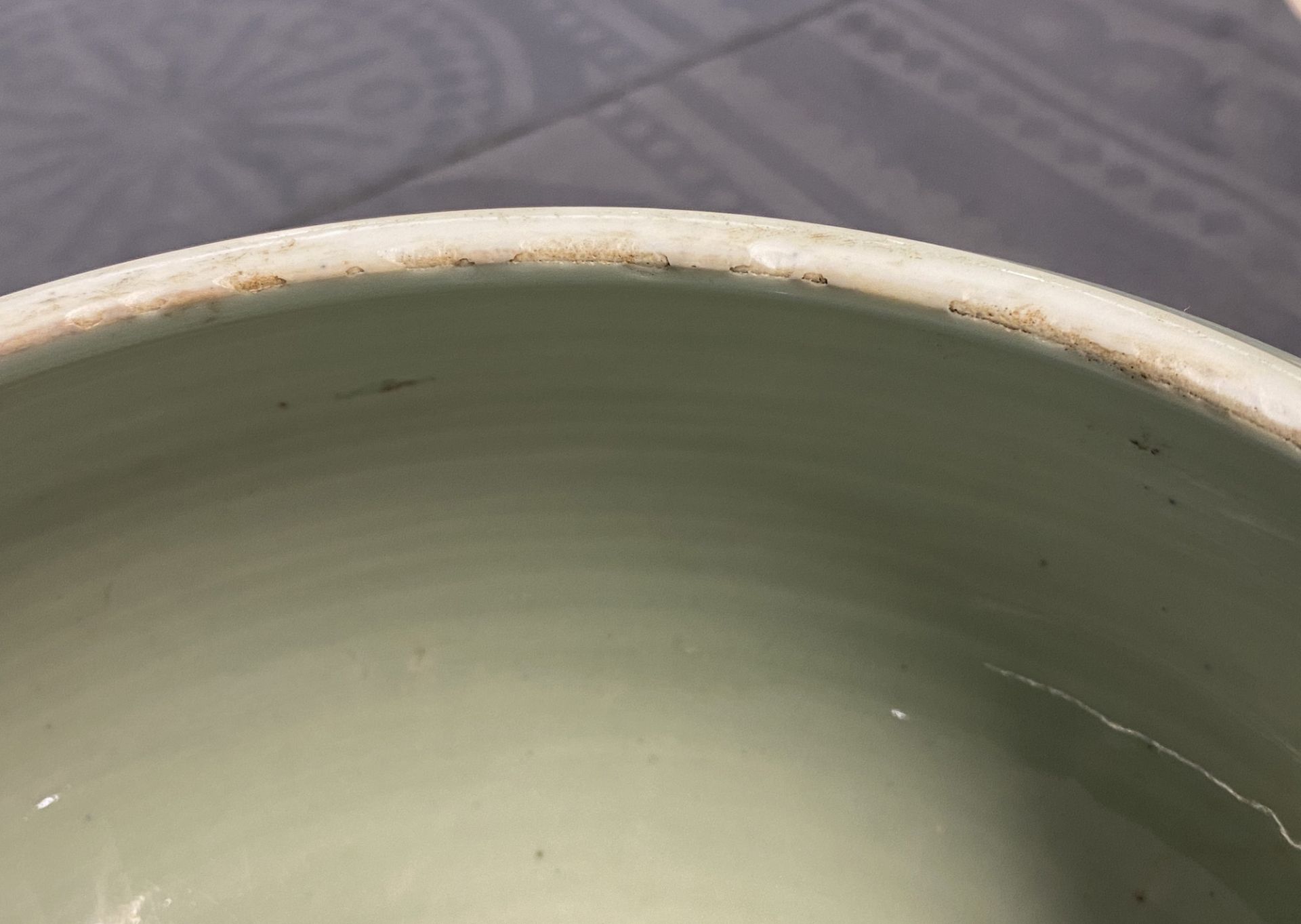 A Chinese celadon-glazed tripod censer with incised underglaze design, Kangxi - Image 15 of 26