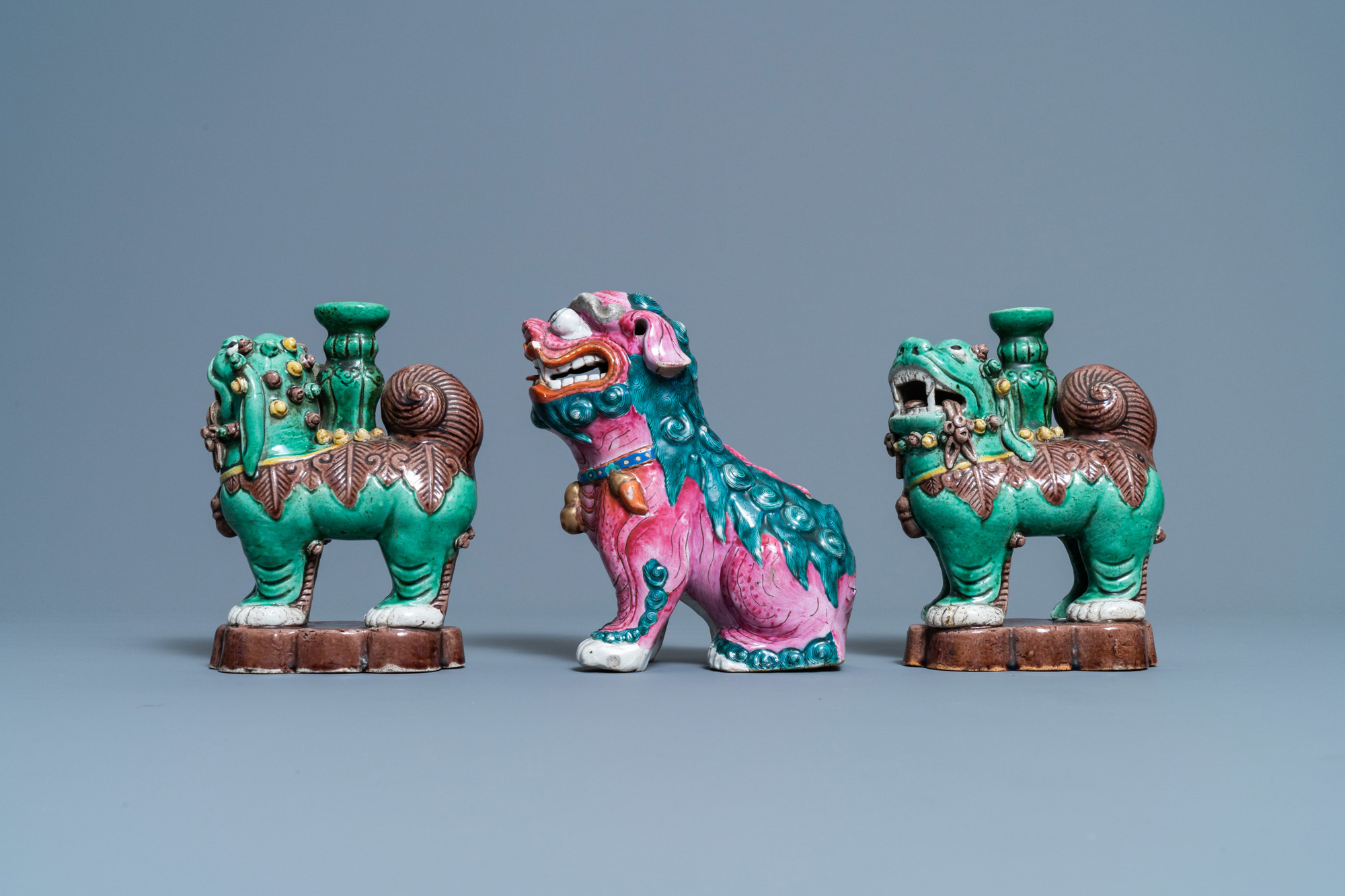 A Chinese famille rose model of a Buddhist lion and a pair of verte biscuit joss stick holders, 19th - Image 4 of 7