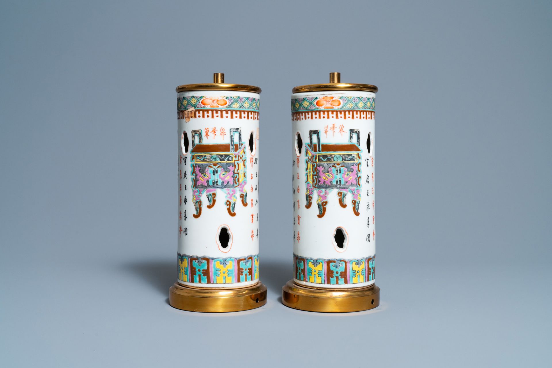 A pair of Chinese reticulated famille rose hat stands mounted as lamps, 19th C. - Image 4 of 7