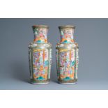 A pair of Chinese Canton famille rose vases, 19th C.