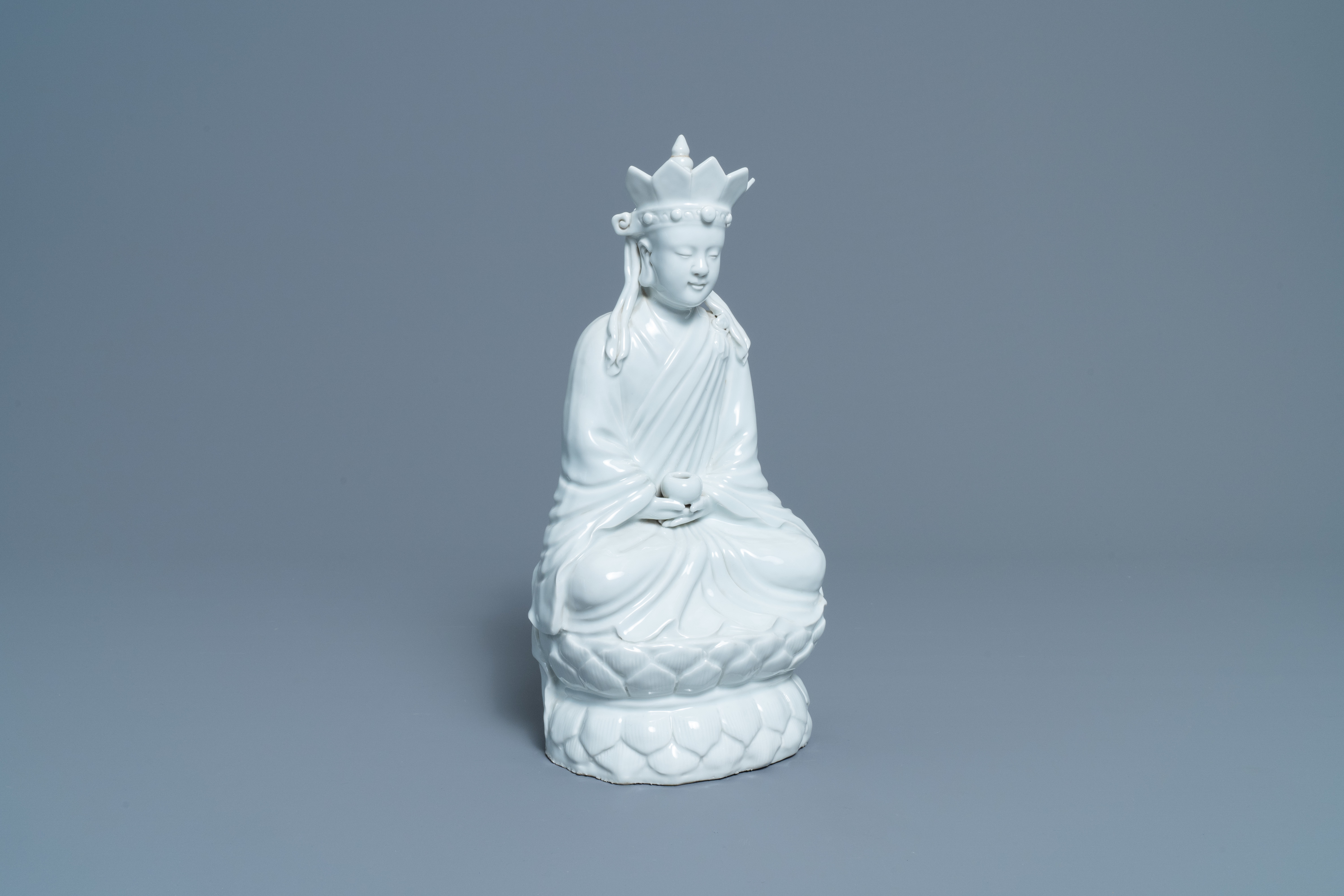 A Chinese blanc de Chine figure of Doumu, seal mark, 19/20th C.