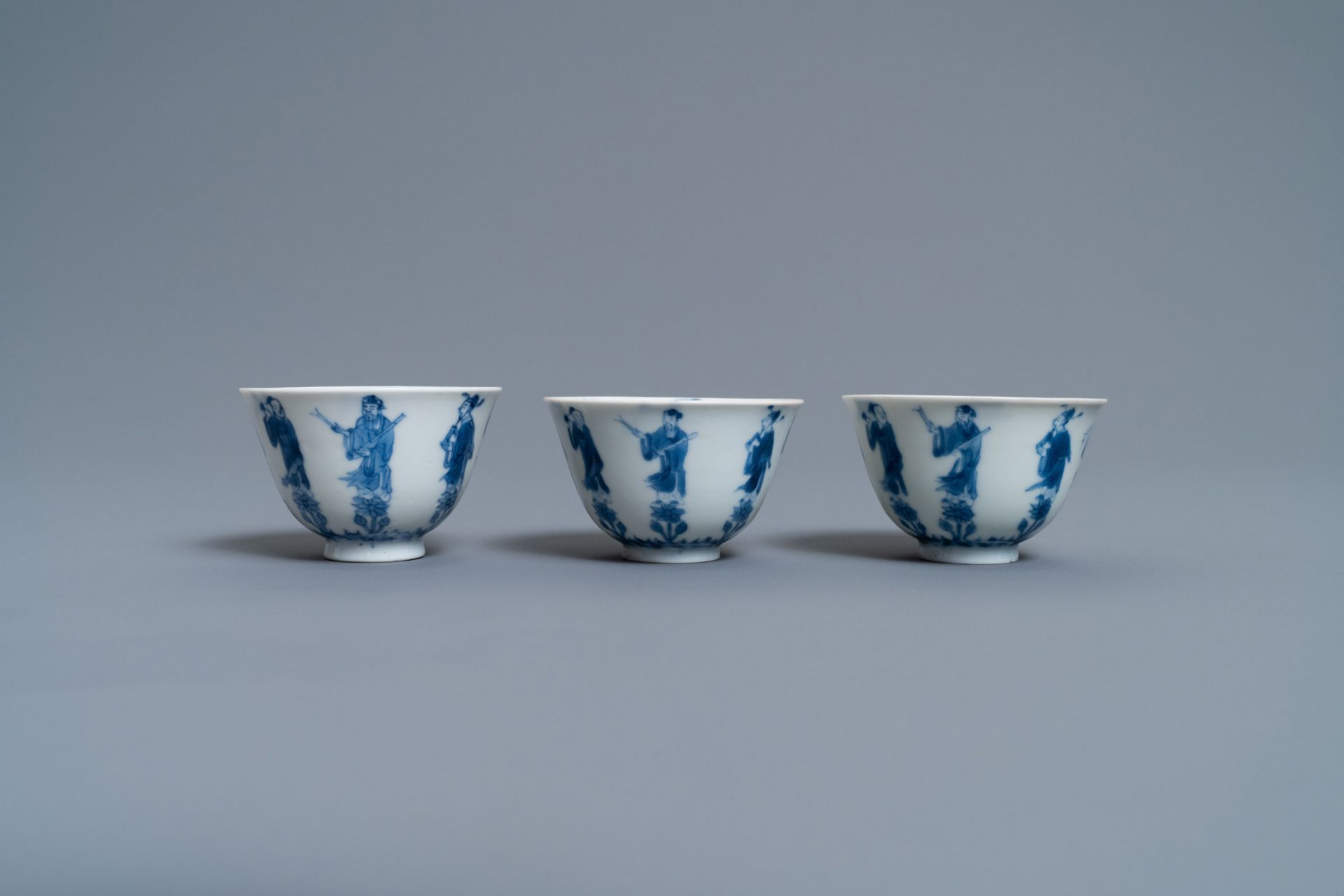 Three Chinese blue and white cups and two saucers, Kangxi - Image 5 of 9