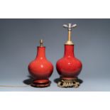 Two Chinese monochrome sang de boeuf-glazed bottle vases transformed into lamps, 19th C.