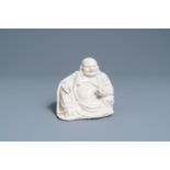 A Chinese Dehua blanc de Chine figure of Buddha, 18/19th C.