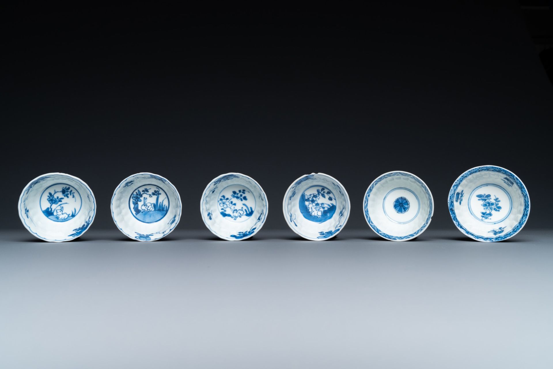 Twenty-three Chinese blue and white saucers and seventeen cups, Kangxi - Image 16 of 17