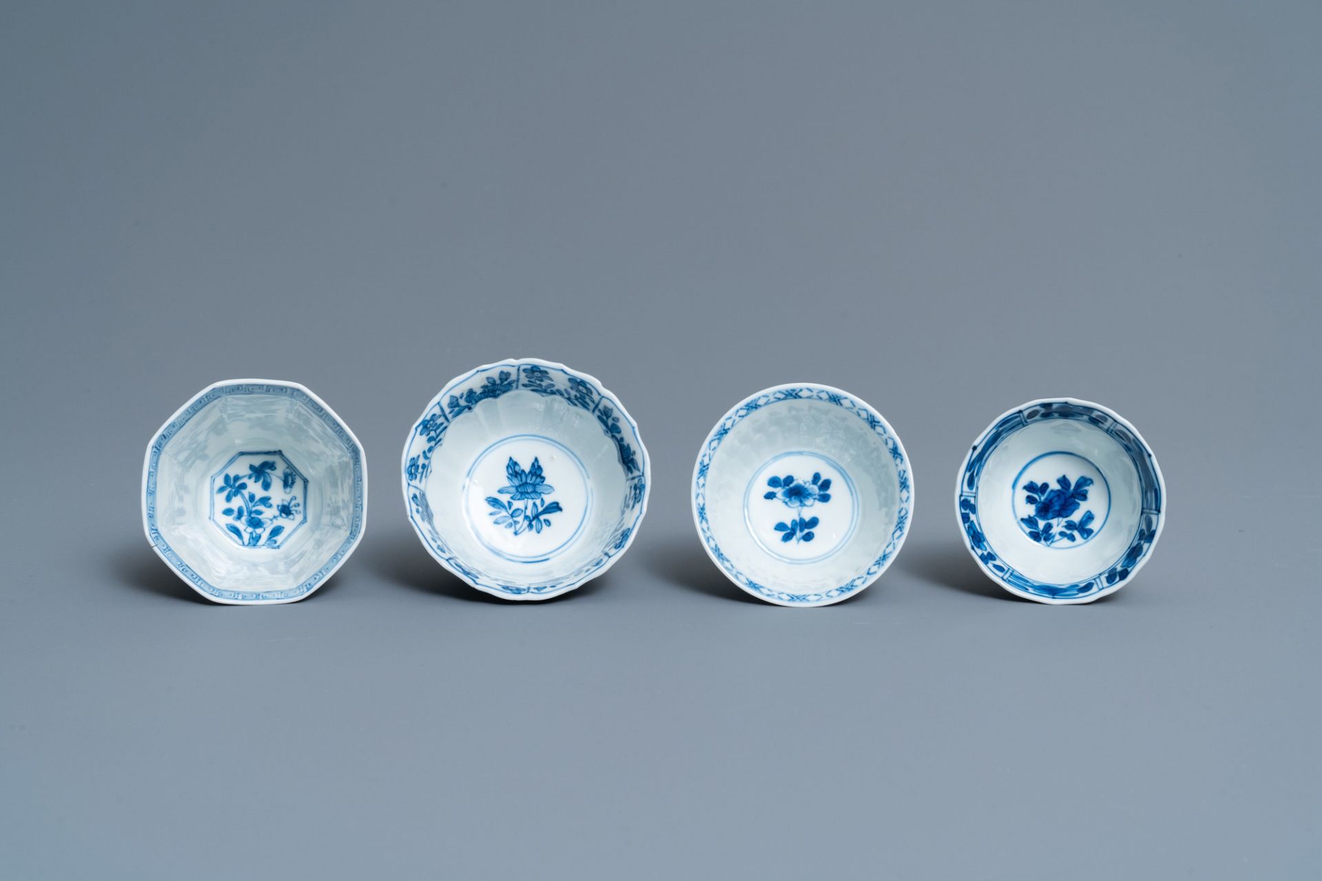 Twenty-one Chinese blue and white saucers and eighteen cups, Kangxi - Image 6 of 17
