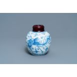 A Chinese blue and white 'dragon and phoenix' jar with wooden lid, Chenghua mark, Kangxi